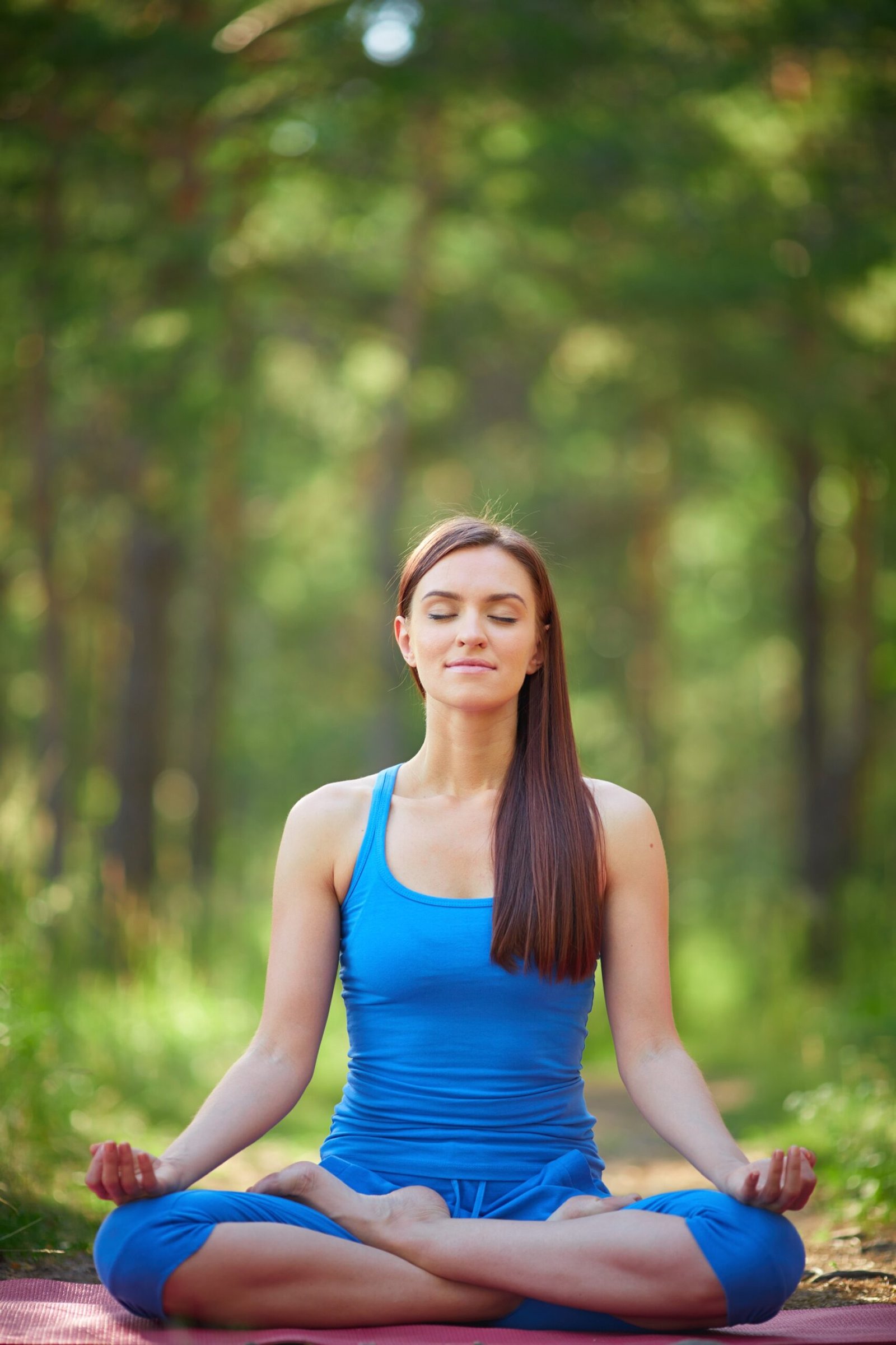 woman sitting cross legged meditation (1) (1)